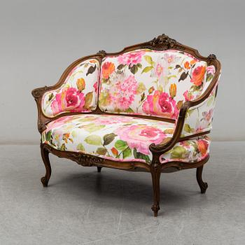 An early 20th Century sofa in Rococo style.