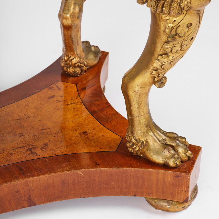 A presumably Austrian Empire centre table, early 19th century.