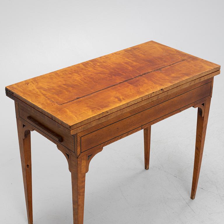 A birch card table, 19th Century.