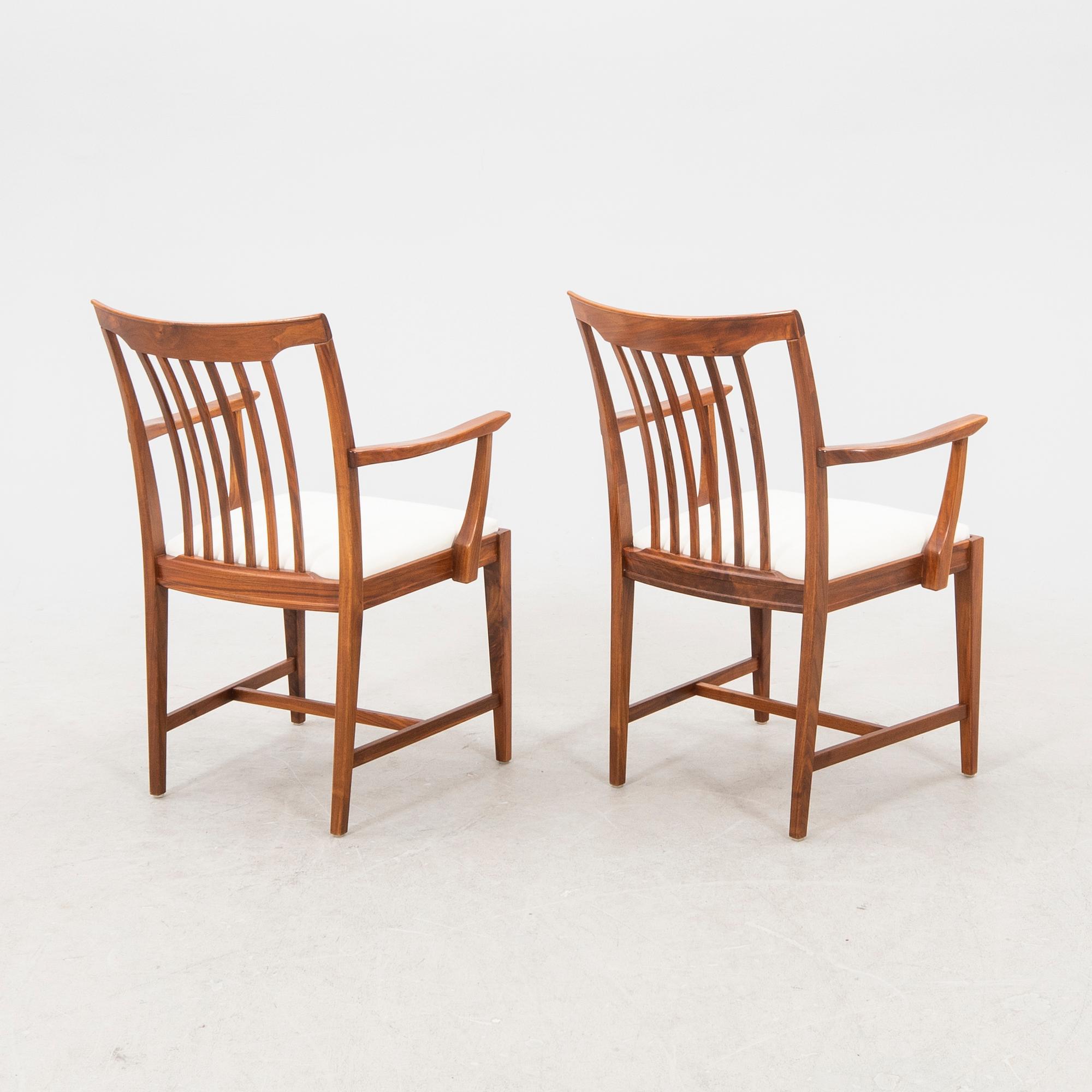 Svante Skogh, apiar of walnut "Vindö" armchairs.