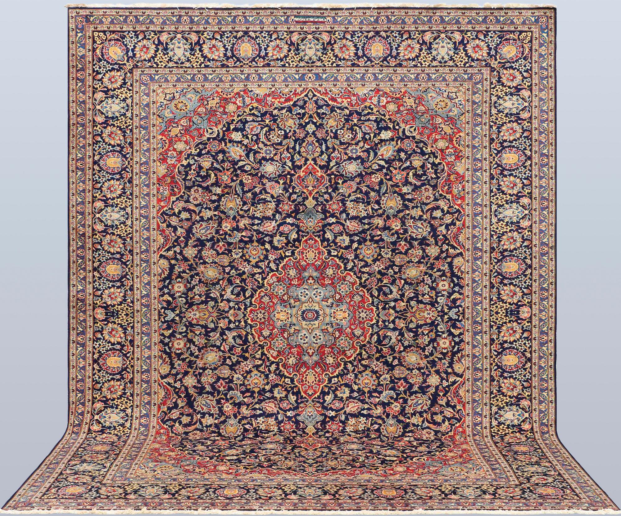 A Keshan carpet, 338 x 264 cm.