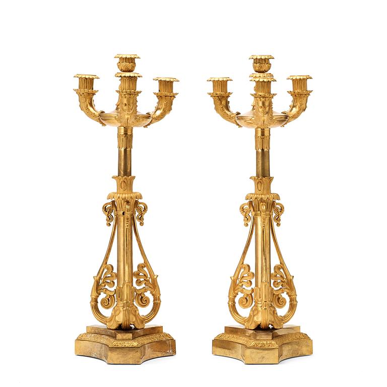 A pair of French Louis Philippe 19th century gilt bronze candelabra.