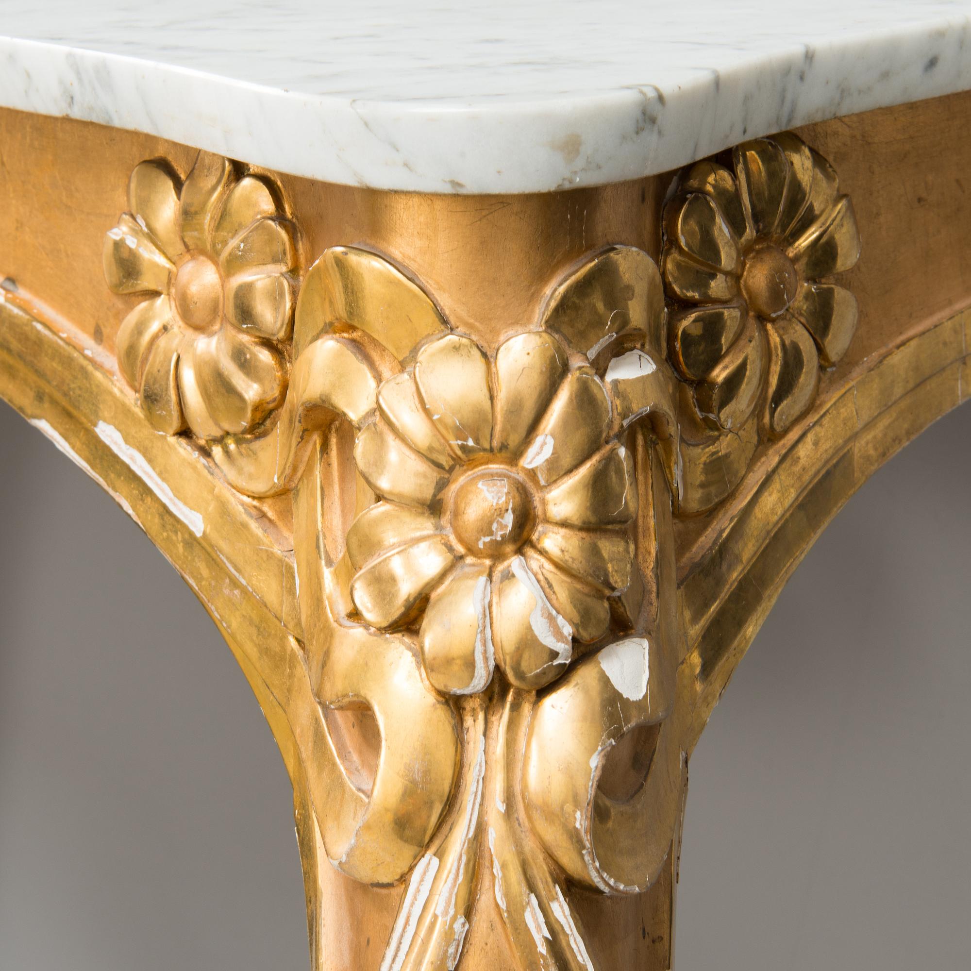 An Art Nouveau mirror with console table from early 20th century.