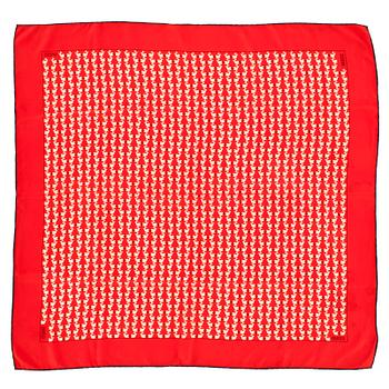 566. GUCCI, three silk scarves.