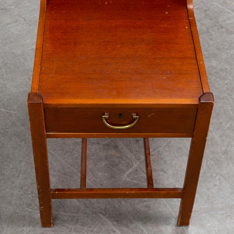 A pair of late 20th Century bedside tables.