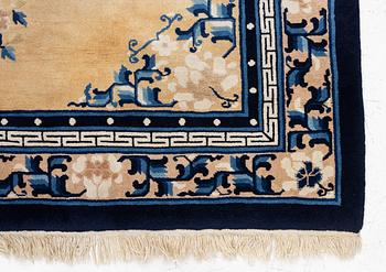 A semi-antique chinese rug, c. 195 x 132 cm .