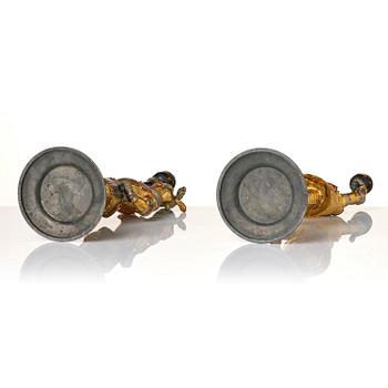 A pair of presumably German knights candlesticks, secound half 19th century.