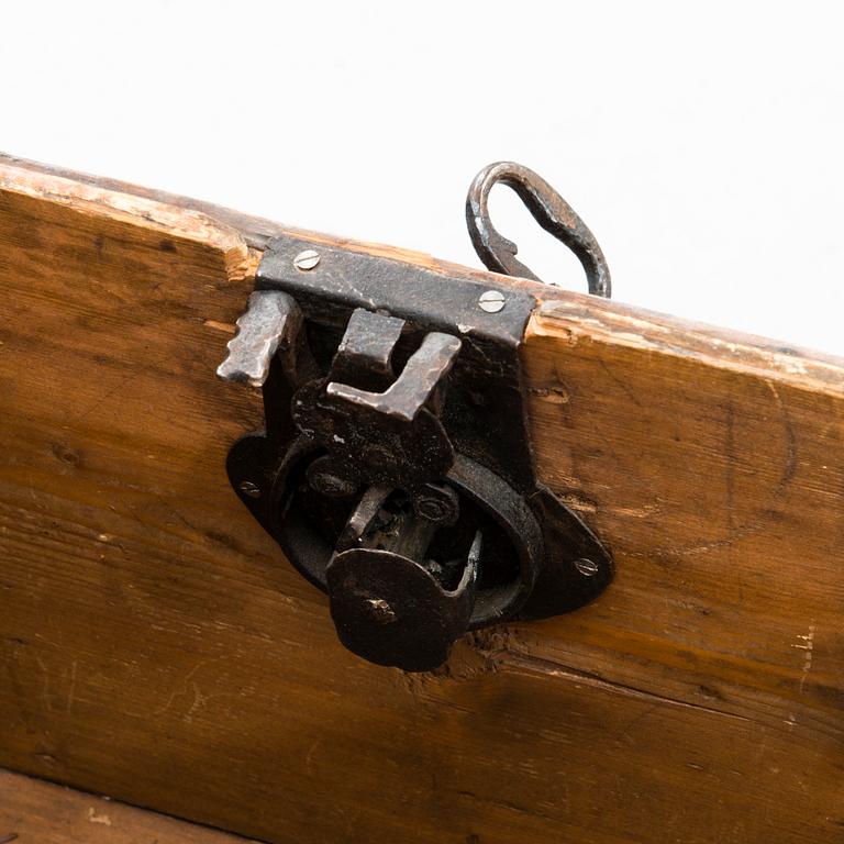A oak baroque chest on a later leg frame.
