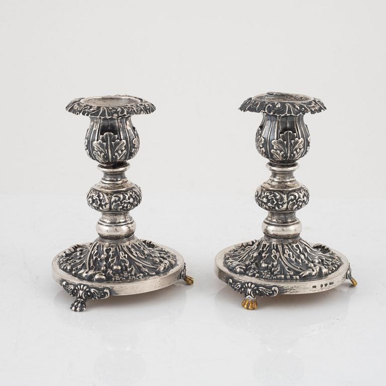 Candlesticks, a pair, Gustaf Möllenborg, Stockholm 1844, and two salt cellars including CG Hallberg, Stockholm 1897.