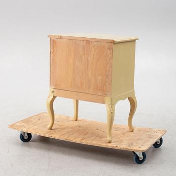 A Rococo style chest of drawers, mid-20th century.