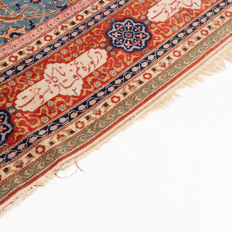 An antique Benlian Tabriz carpet, signed Jabarzade, ca 365 x 270 cm.