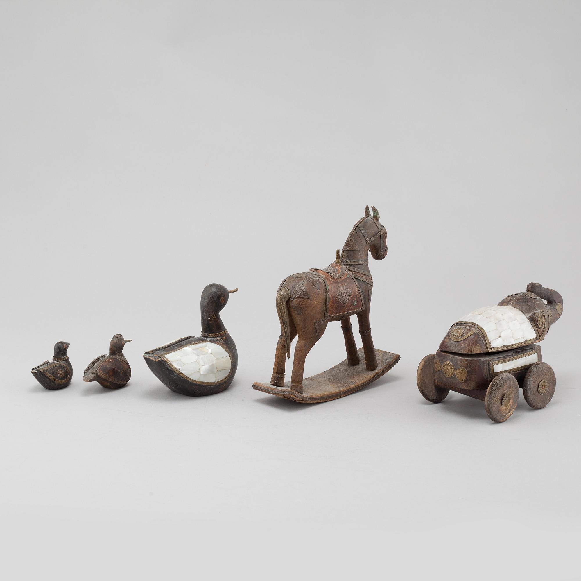 Five wooden toys from the latter half of the 20th century.