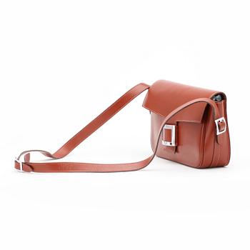 HERMÉS, a brown leather shoulder bag.