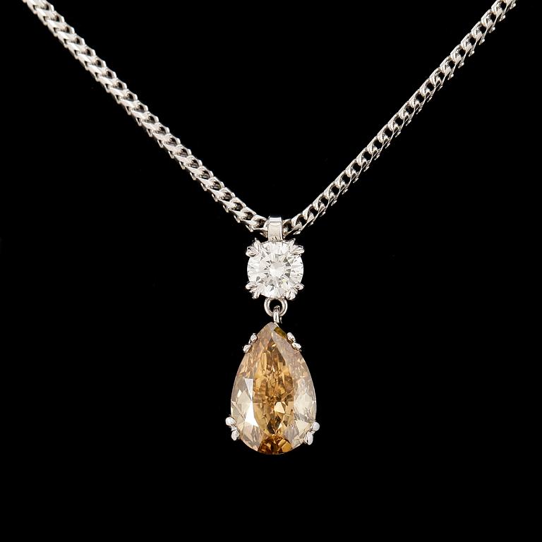 HÄNGE, droppslipad gulbrun (fancy colour) diamant, 2 ct, briljantslipad diamant 0.30 ct. Total vikt ca 6 g.