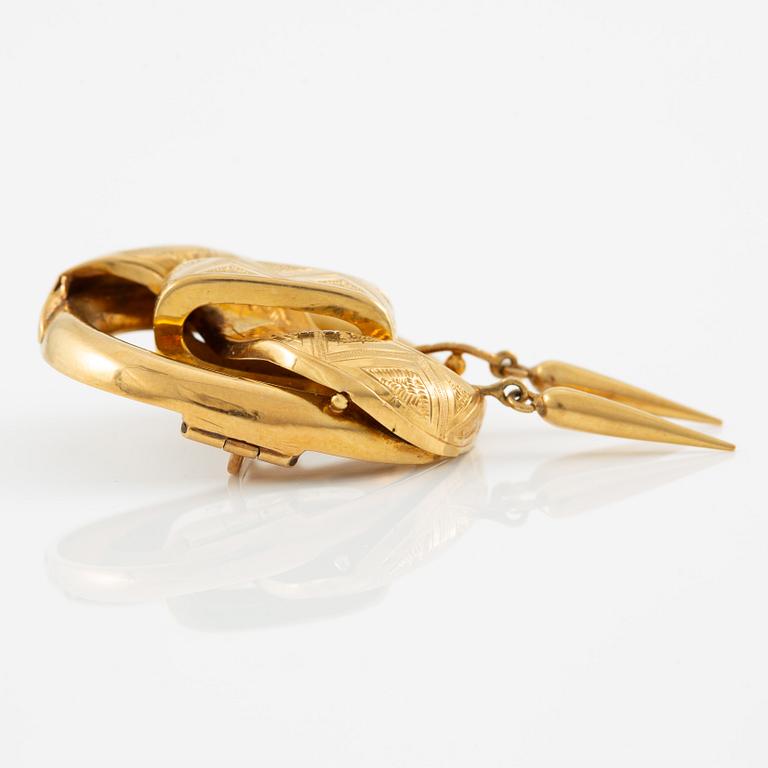 Brosch 18K guld.