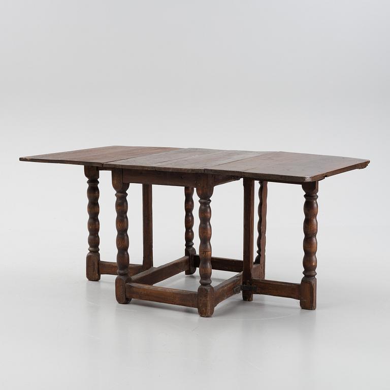 A baroque gate-leg table, 18th century.