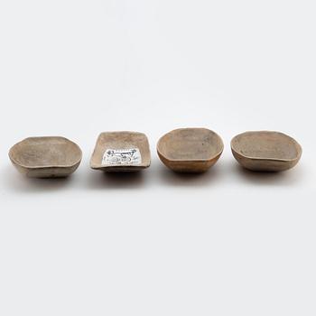 Four wooden bowls, 19th-20th Century.