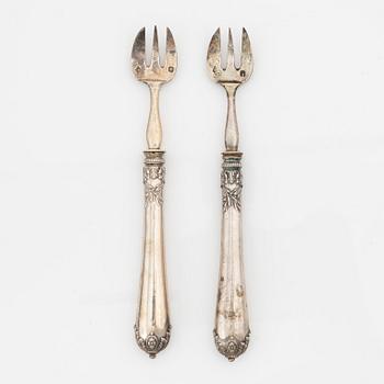 Philippe Berthier, a set of 12 silver oysterforks, mid 19th century.