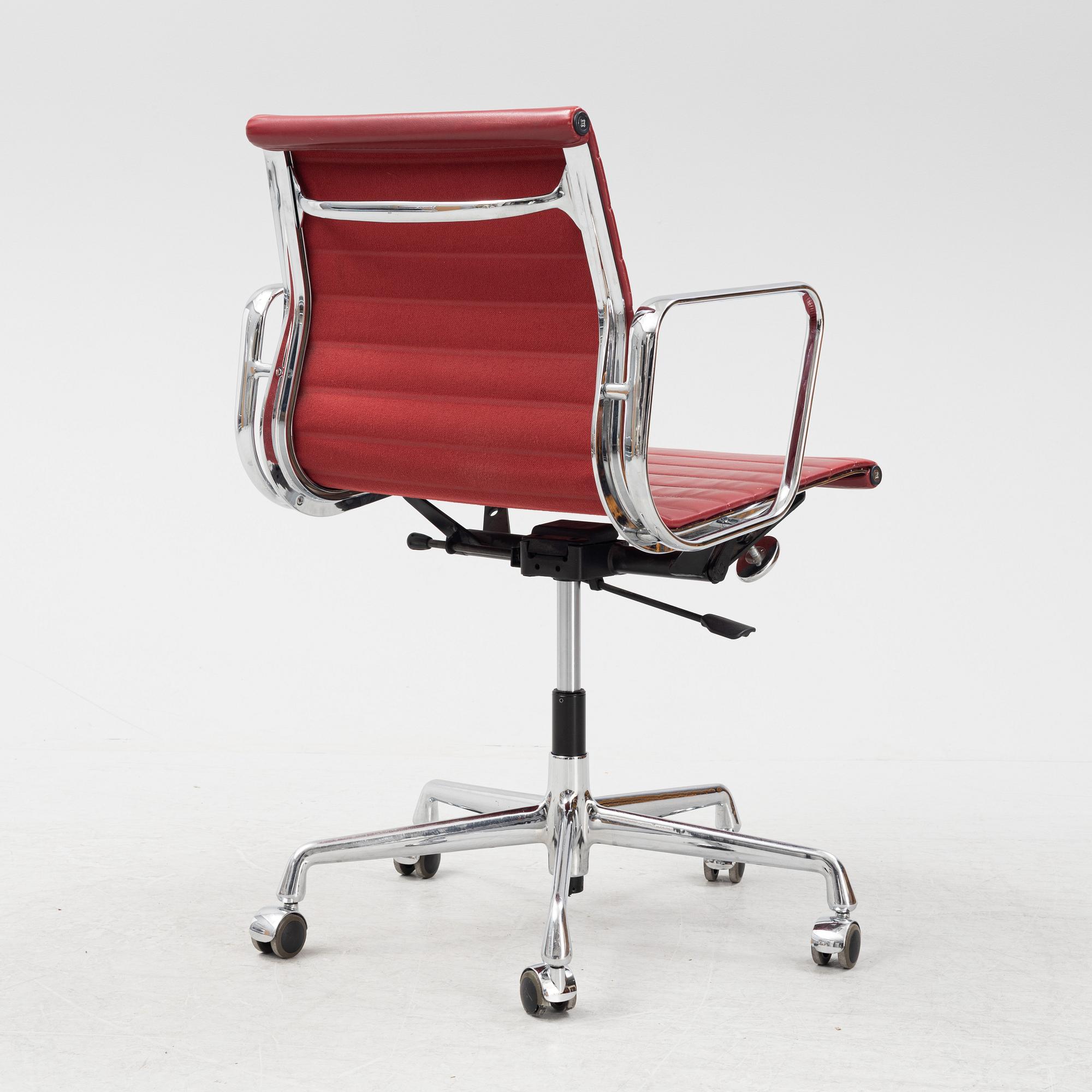 Charles & Ray Eames, a chrome swivel chair 'EA 118', Vitra.