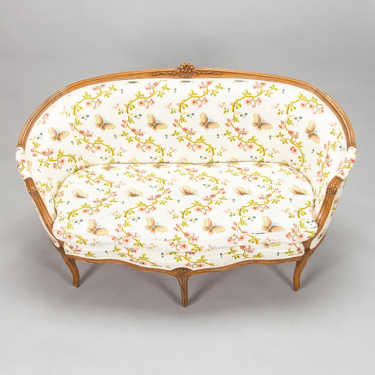 A French, mid-18th-century Louis XV sofa.