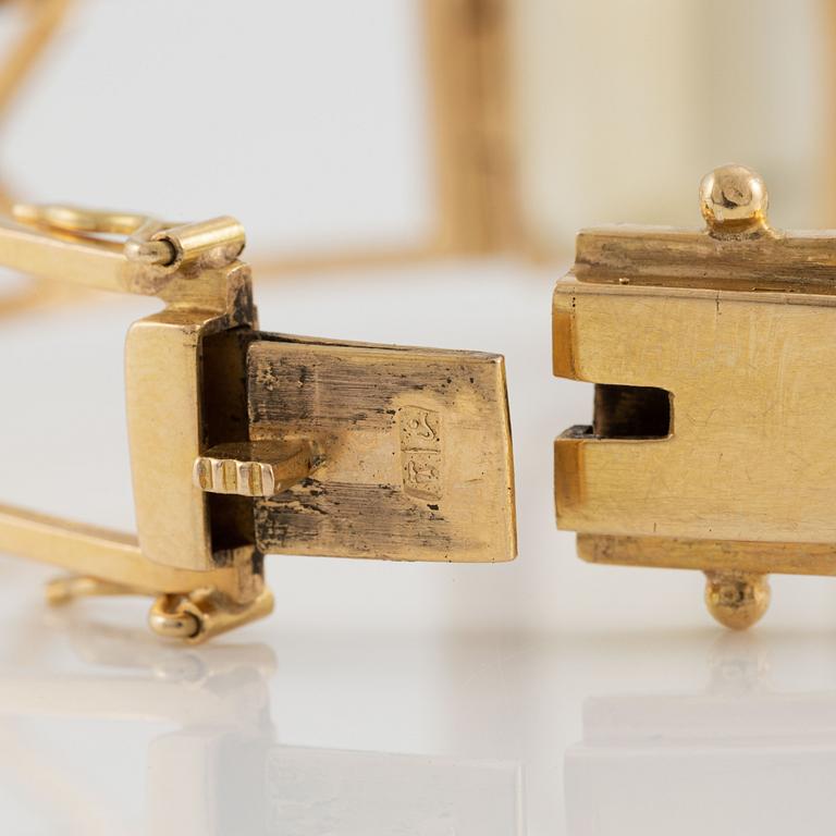 Armband 18K guld med fasettslipad kvarts.