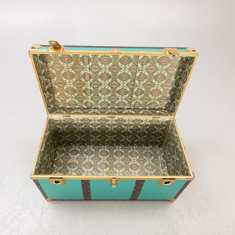 A mid 1900s metal trunk.