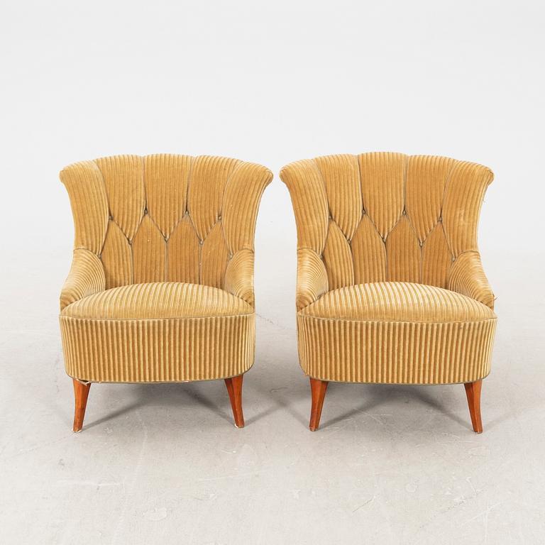 A pair of 1940/50s easy chairs.