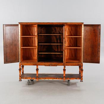 A 1920/30s swedish grace cupboard, model "Sture", made by AB Seffle Möbelfabrik.