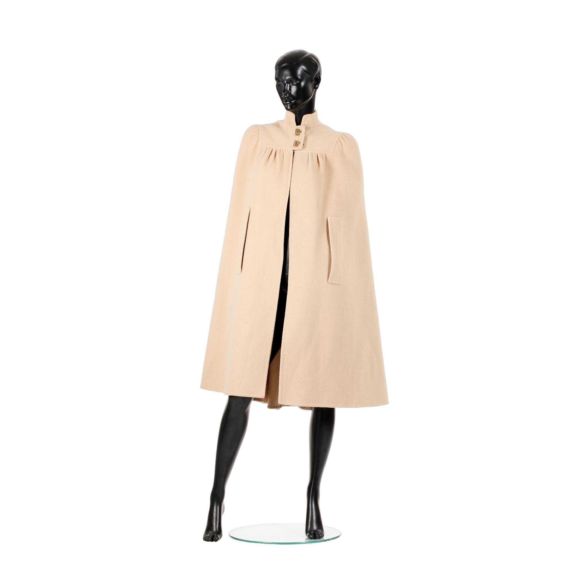SALVATORE FERRAGAMO, a beige wool cape.