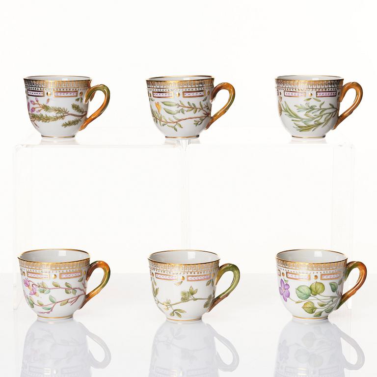 A set of 9 Royal Copenhagen 'Flora Danica' coffee cups with stands, Danmark, 20th Century.