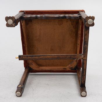 A Baroque-style dining table with six chairs, around 1900.