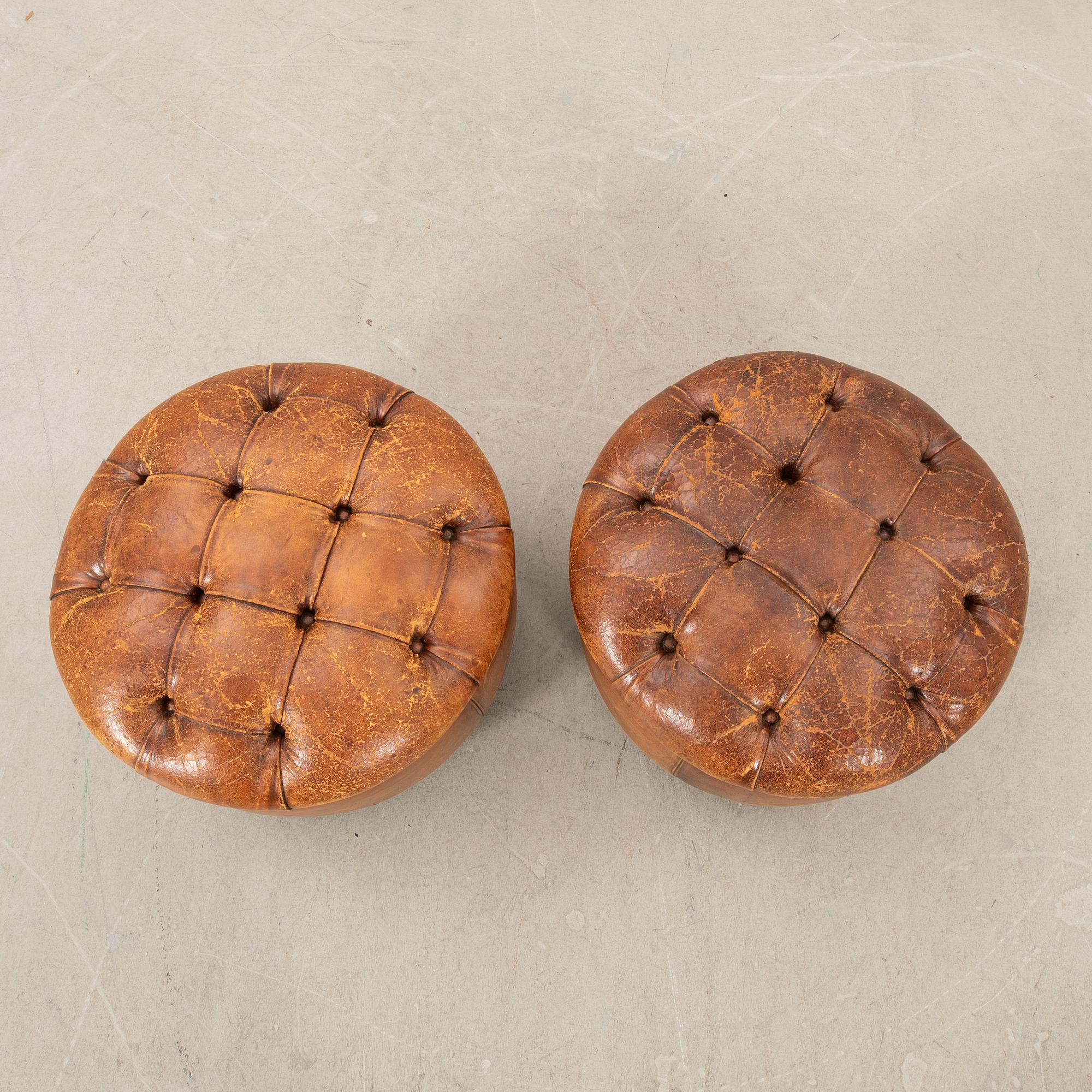 Ottomans, a pair from the second half of the 20th century.