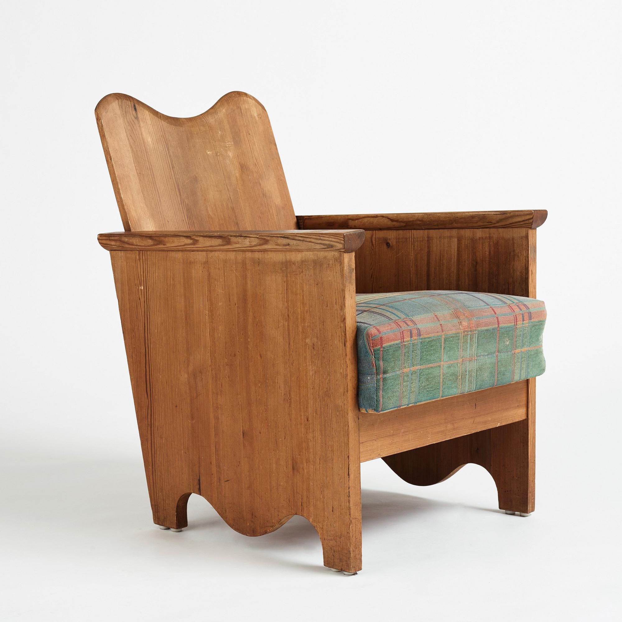 Axel Einar Hjorth, a stained pine easy chair "Utö", Nordiska Kompaniet, Sweden 1930's.