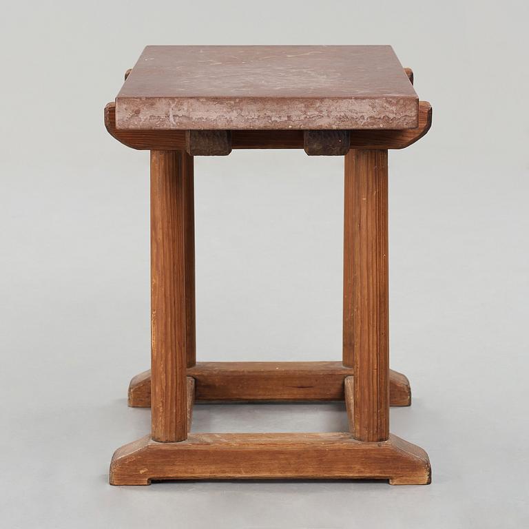 Axel Einar Hjorth, a red limestone top and stained pine side table, Nordiska Kompaniet, Sweden 1929.