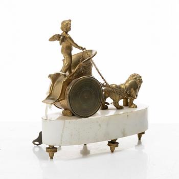An Empire table clock, likely Northern Europe, early 19th century.