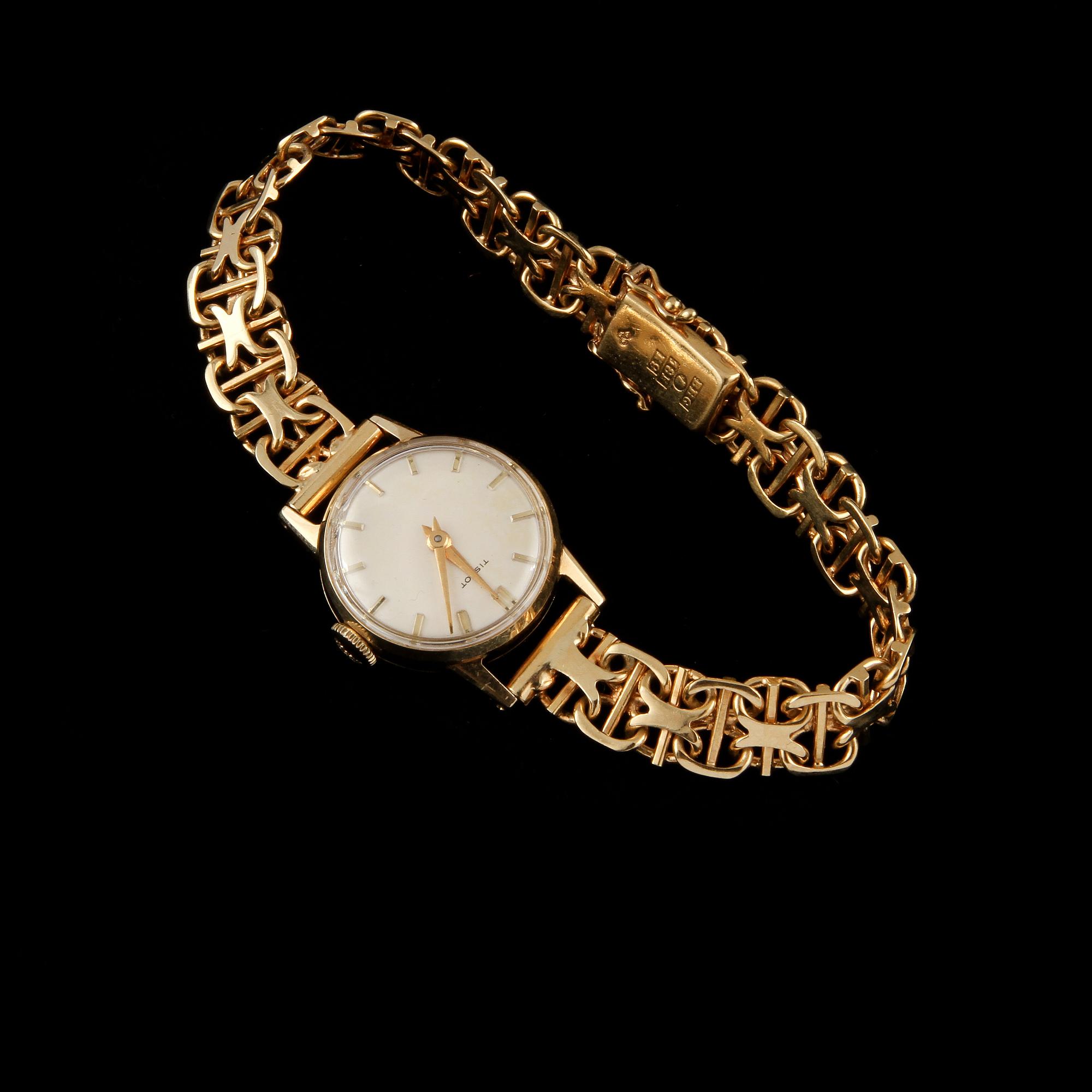 ARMBANDSUR, dam, 18 k guld, Tissot, 1960-tal, total vikt 23 g.