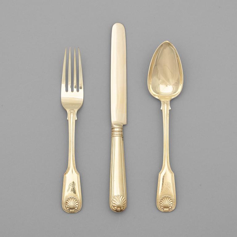 A Russian 19th century 36 piece silver-gilt dessert-cutlery, mark of Johan Fredrik Falck, St Petersburg 1842.