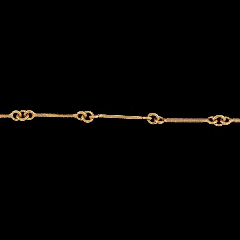 COLLIER, 18k guld med briljantslipad diamant ca0,10ct (enl grav), Lapponia Finland, 1990. Vikt 13,8g.