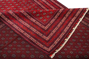 An Afghan carpet, c. 292 x 200 cm.