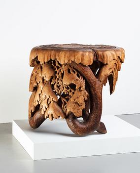 Knut Fjaestad, A Knut Fjaestad Art Nouveau sculptured pine table, Sweden ca 1900.