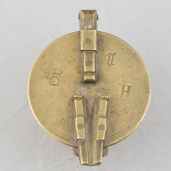 A set of three Nuremberg brass nested cup weights, one by Christoph or Johan Conrad Schön (masters 1746(1750).