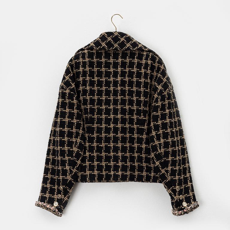 Chanel, a bouclé jacket size 34.