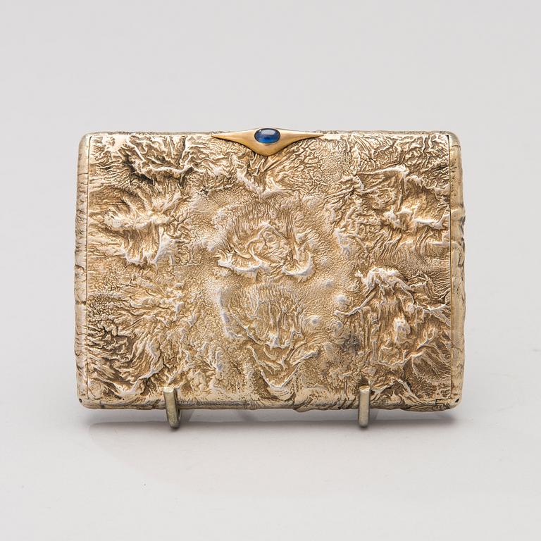 A silver gilt cigarette case by Ivan Katorskij, Saint Petersburg 1896-1908.