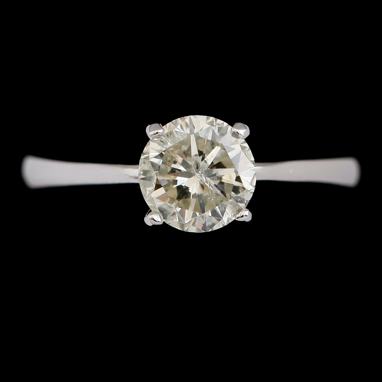 RING, 18 k vitguld, solitär briljantslipad diamant ca 1.29 ct.