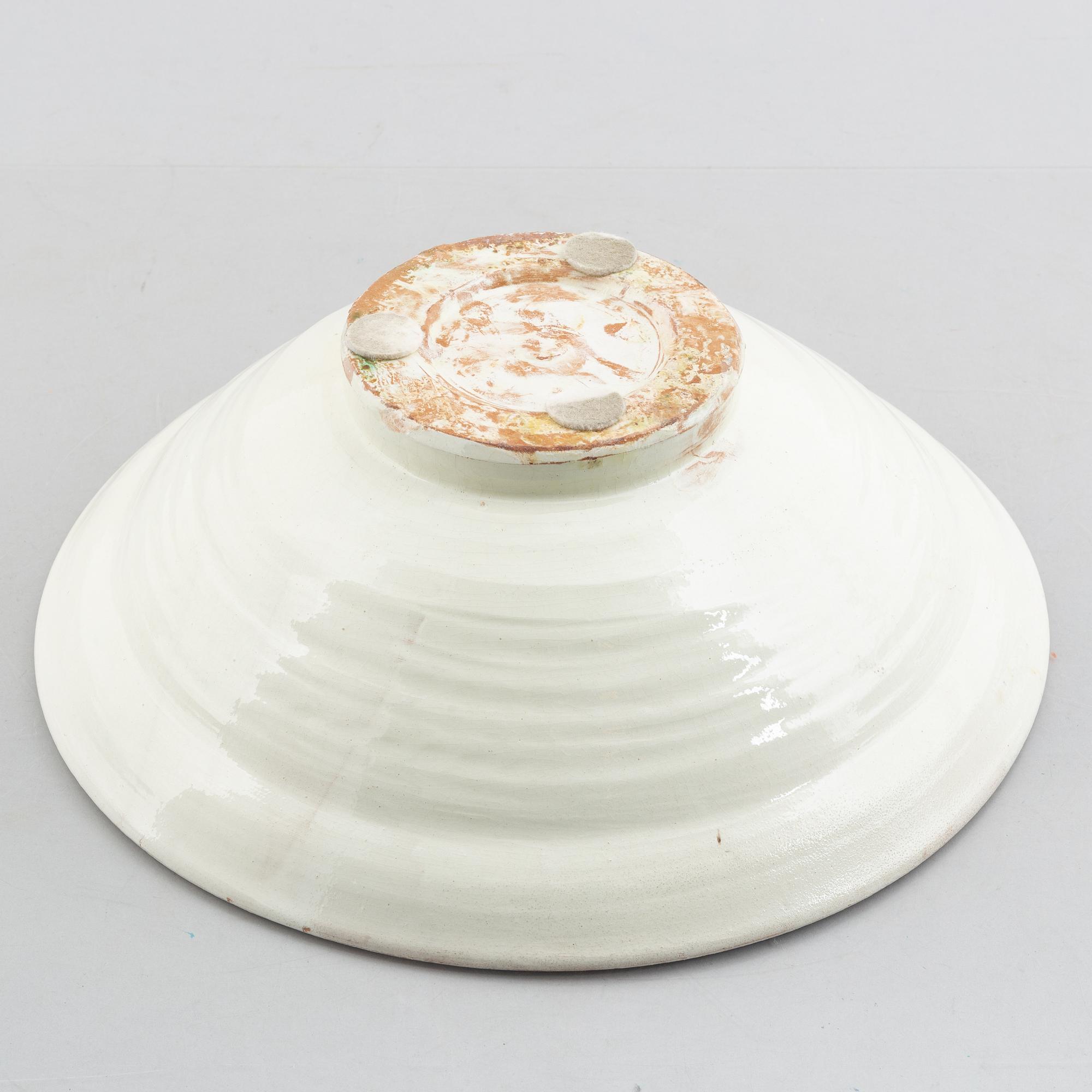 A faience bowl, circa 1900.