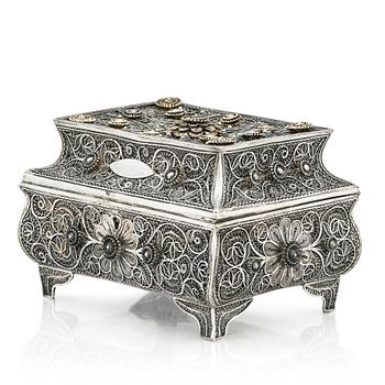 A 19th Century silver filigree box, unidentified makers mark R.K, Assay master mark of Ivan Lebedkin, Moscow 1898-1908.
