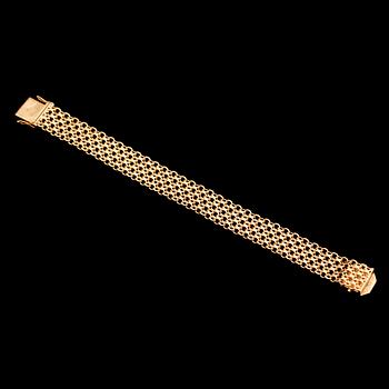 ARMBAND, 18 k guld, NGJ 1963. Vikt 28 g.