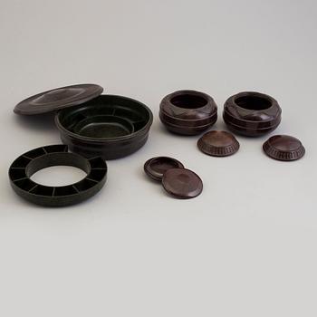 A set of nine swedish and english bakelite boxes, 1930's.
