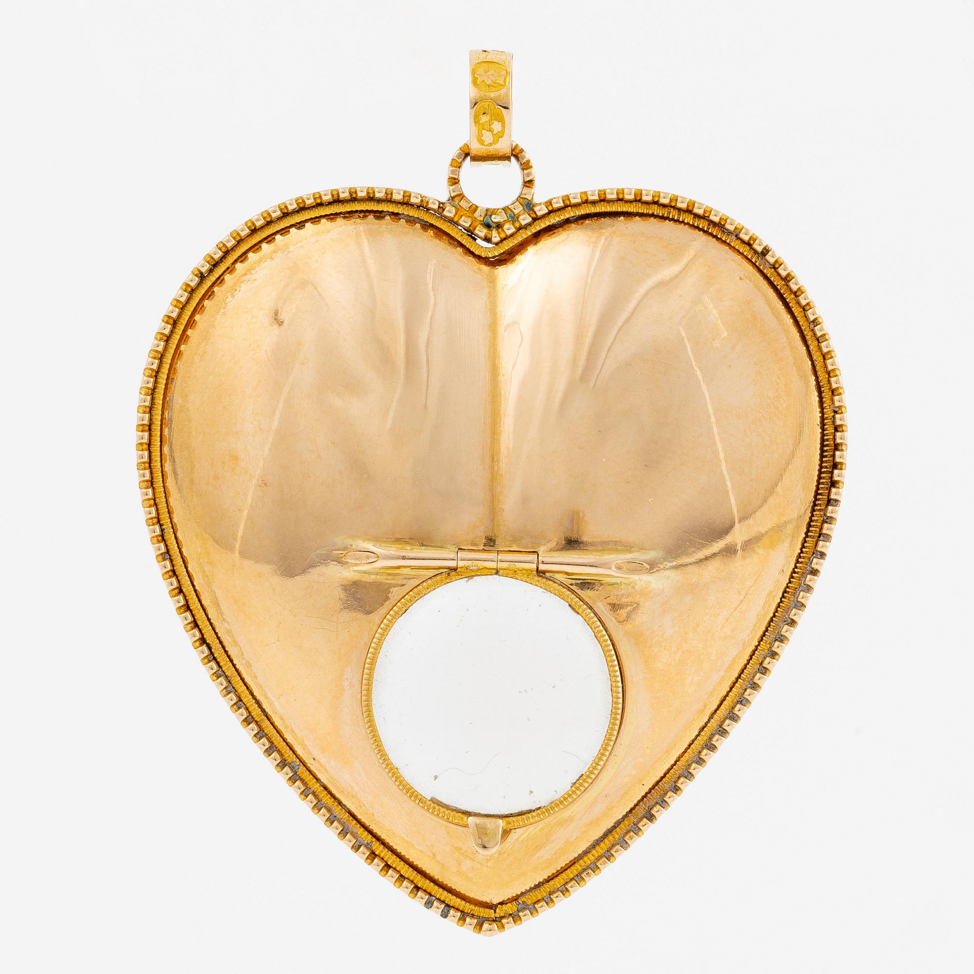 Heart locket, 18K gold with glass.