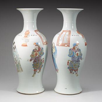 A pair of large Chinese famille rose vases, 20th Century with seal mark in red.